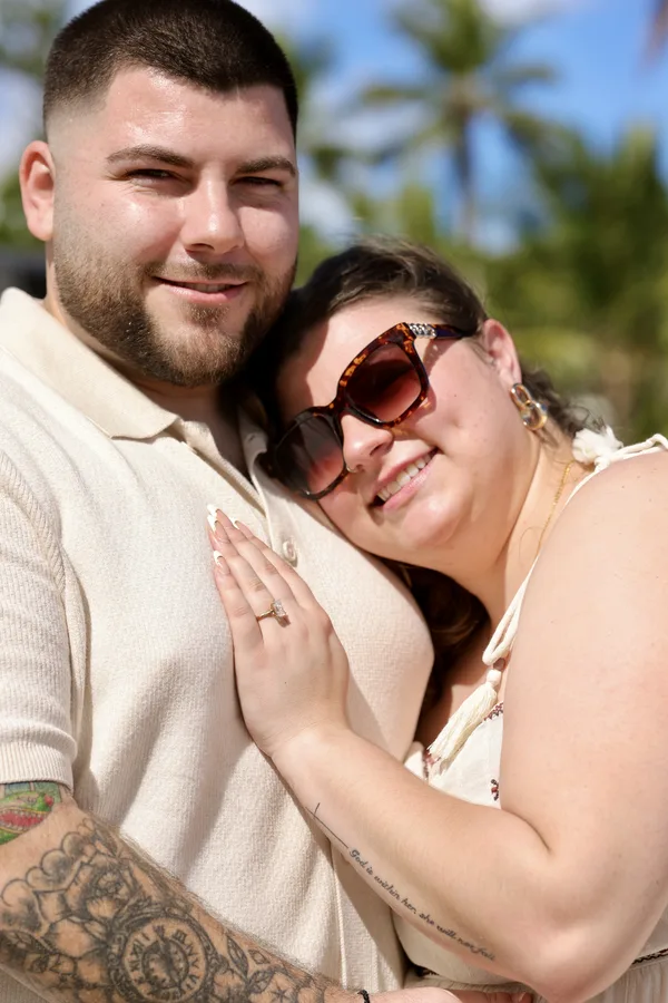 Newly engaged couple in a styled portrait right after the proposal